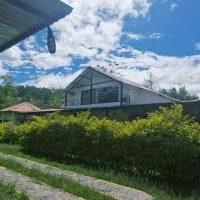Habitación Orquídea - Hospedaje Rural La Fortaleza Pacho，位于San Miguel的酒店