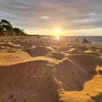 Pousada O Povorello - a 1 minuto a pé da Praia Grande da Baía do Sol，位于莫斯凯鲁的酒店