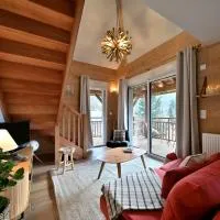 Superbe appartement - Face au lac，位于Génos的酒店