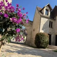 Le Château des saveurs，位于Mello的酒店