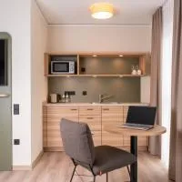 Hotel Neue Mitte，位于施吕希滕的酒店