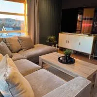 Modern and cozy apartment in Heimdal，位于特隆赫姆的酒店