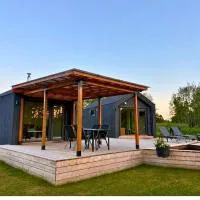Rātes Krasti - Rasa - holiday house with sauna and lakeview，位于Lejasciems的酒店
