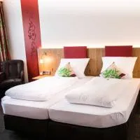 按时客房旅馆，位于Forstinning的酒店