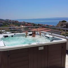 Villa Arya with heated swimming pool, roof hot tub, sauna and gym near the beach