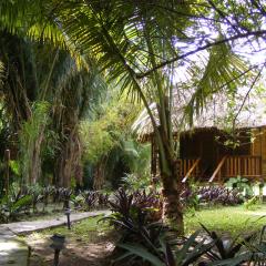 Cohune Palms River Cabanas