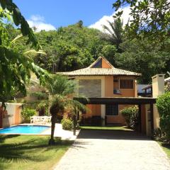 Casa frente praia na av beira mar com piscina