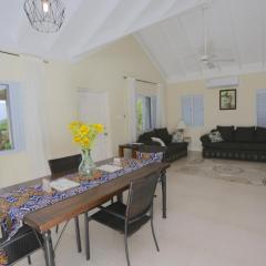 Richmond - Heroes Villa, AC, Security, Access to Pool, Playground & Private Beach - Welcome Breakfast Basket