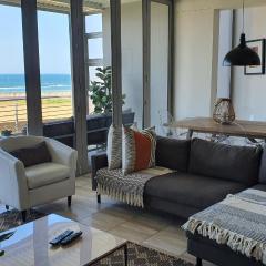 Accommodation Front - Gorgeous 4 Sleeper Beachfront Apartment