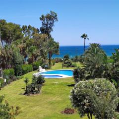 Spacious Beachfront Town House in Estepona with Fully Equipped Kitchen, Pools, Garden, Sea View