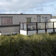 AMELAND-Nes-Duinoord: Stacaravan (chalet) + fietsen direct aan zee!