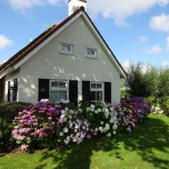 Attractive holiday home with jetty