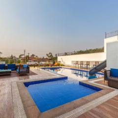 StayVista's White Pebbles - A Villa with Theater Room & Swimming Pool