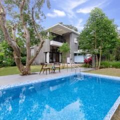Villa Foresta by StayVista with Modern decor, Swimming pool & Expansive lawn for a perfect escape