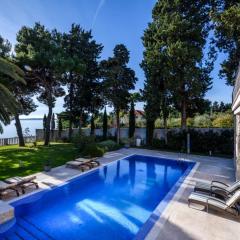 Luxury Seafront Villa Castello Split with private heated pool, jacuzzi and sauna at the beach in Split