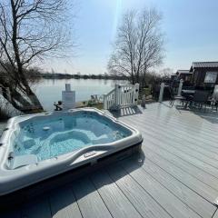 Indulgence lakeside lodge i1 with hot tub, private fishing peg situated at Tattershall Lakes Country Park