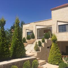 4 bedrooms house with city view balcony and wifi at Amman