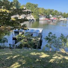 Cozy Lake Cabin Dock boat slip and lily pad