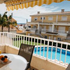 Townhouse with terraces and communal pool