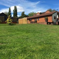 Woodcutters Barn, overlooking Ledbury & Malvern Hills