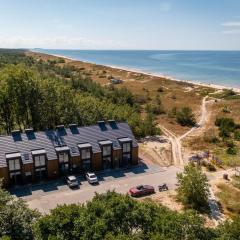 Apartamentai ant jūros kranto Preiloje