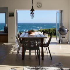 Seafront house with a view