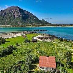 Koselig hus med strandlinje