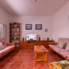 3 bedrooms house at Los Caserones 50 m away from the beach with enclosed garden and wifi