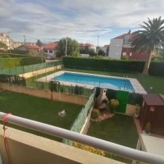 Apartamento céntrico con piscina y garaje