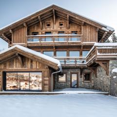 Le Grand V, chalet de luxe avec piscine intérieure