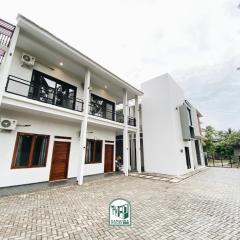 Kmanda House