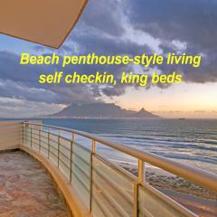 Beach penthouse-style living,self checkin,king beds