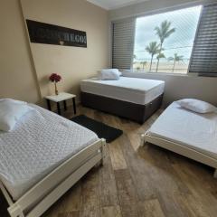 Apartamento Aconchego Frente Mar - Vila Guilhermina Praia Grande SP - Cozinha Completa - Climatizador de Ar - TV a Cabo - Wi-Fi