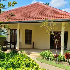 Beautiful bungalow with a communal outdoor pool and 2 km from the sandy beach