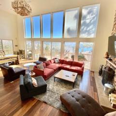 Modern 6 bedroom retreat, stunning lake views, close to village!
