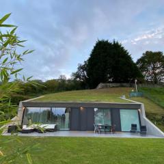 La Casa de Hierba - Casa de campo de diseño con jardín y wifi cerca de las playas de Llanes