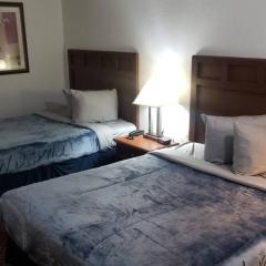 Hotel 2 Queen Beds Hotel Room 222 Wi-Fi Hot Tub Booking