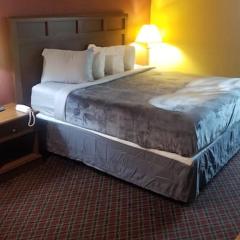 Hotel 2 Queen Beds Hotel Room 106 Wi-Fi Hot Tub Booking