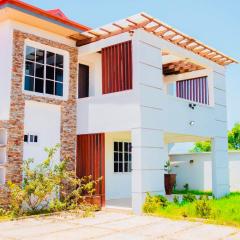 Lovely 4 Bedroom Solar Powered House with CCTV and Unlimited WiFi near Devtraco Court Community 25 Tema