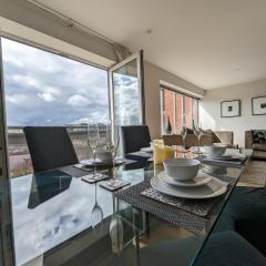 Quayside apartment with riverside views & parking