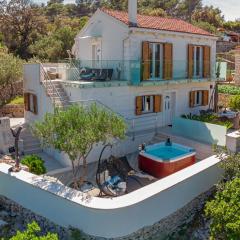 Uniquely designed Villa Ivana with outdoor Jacuzzi nearby the pebble Banje beach at the Island of Solta