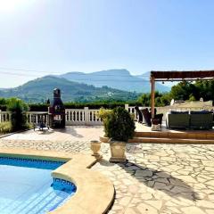 sunny villa with mountain panorama, beach near