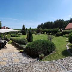 Apartament z ogrodem i jacuzzi