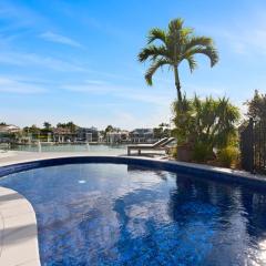 Luxurious Waterfront North Facing 5 bedroom House with pool, pontoon and Deep Water Access near Mooloolaba