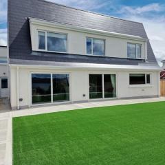 Buncrana Beach House by Wild Atlantic Wanderer