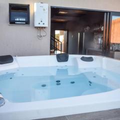 Vila Astra - jacuzzi privativa, natureza e conforto