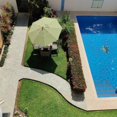 Apartment Tortugas - rooms with AC and great pool at 5 min from Carrizalillo beach and Benito Juarez Bulevard