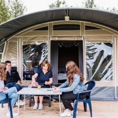 Nice tent lodge on the edge of a forest