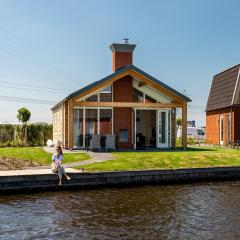 Disabled house on the water, on a holiday park in Friesland