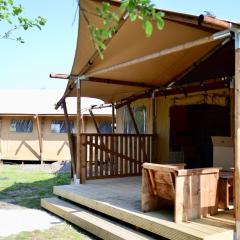 Homely tent with kitchen and shower near the beach